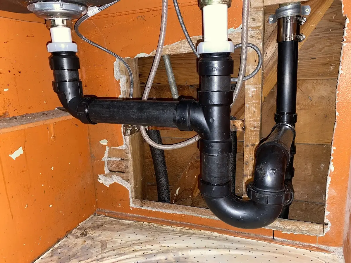 Professional Garbage Disposal Repair equipment and tools on the job in Hazlet